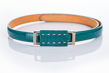 Image showing thin green female belt buckle with fine