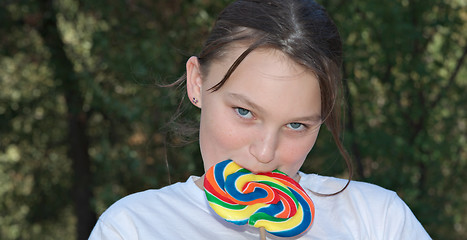 Image showing teenager with lollipop