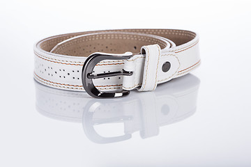 Image showing thin white female belt buckle with fine