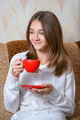 Image showing Girl drinks tea