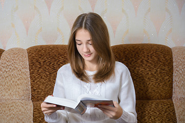 Image showing Girl reading a book