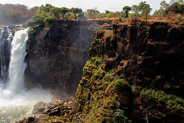 Image showing The Victoria falls with mist from water