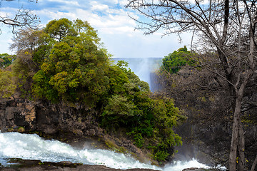 Image showing The Victoria falls with mist from water