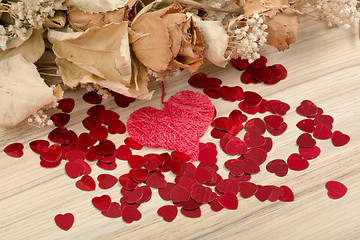 Image showing bouquet of dried roses and red box, valentine