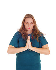 Image showing Praying young woman.