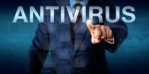 Image showing Manager Touching ANTIVIRUS On A Screen