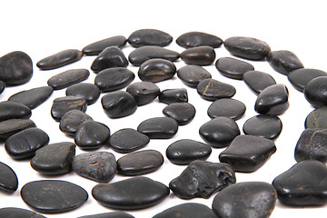 Image showing black stones spiral background