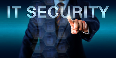 Image showing Entrepreneur Pressing IT SECURITY Onscreen