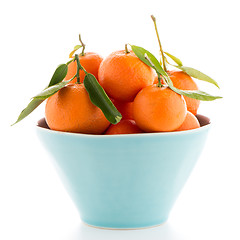 Image showing Tangerines on ceramic blue bowl 