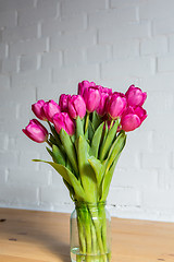 Image showing beautiful pink tulips in a vase