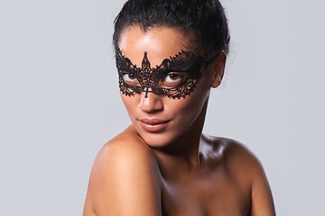 Image showing Closeup portrait of beautiful mixed race with black lace mask