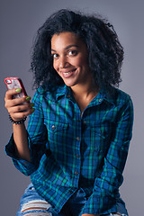 Image showing Woman using her cell phone