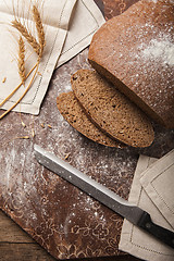 Image showing Bread rye spikelets on an wooden background