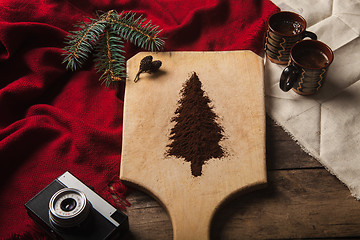 Image showing The two cups of coffee on wooden background