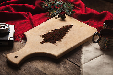 Image showing The two cups of coffee on wooden background