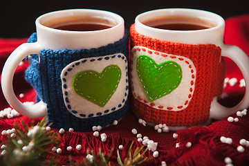 Image showing Two warm cups of tea or coffee with heart for Valentine\'s day