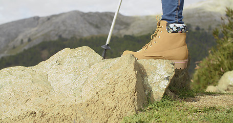 Image showing Person in hiking boots at the mountains