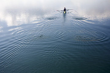 Image showing Young man rowing