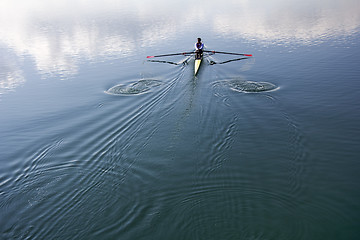 Image showing Young man rowing