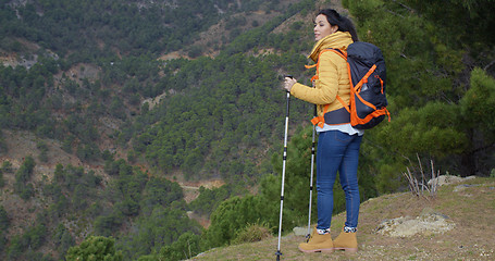 Image showing Young woman enjoying a mountain hike