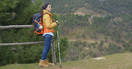 Image showing Young woman hiking on a mountain plateau