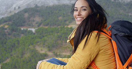 Image showing Happy vivacious young woman backpacker