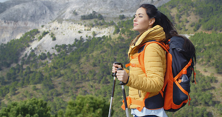 Image showing Young woman hiker enjoying the view