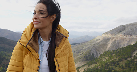 Image showing Smiling woman appreciating the peace of nature