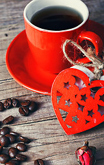 Image showing Cup decorated with wooden hearts