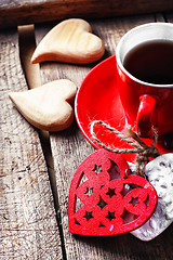 Image showing Cup decorated with wooden hearts