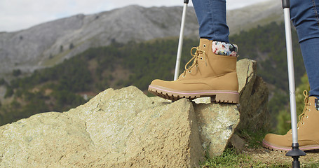 Image showing Person in hiking boots at the mountains