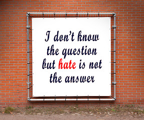 Image showing Large banner with inspirational quote on a brick wall