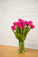 Image showing beautiful pink tulips in a vase