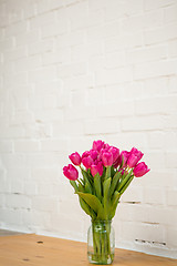 Image showing beautiful pink tulips in a vase