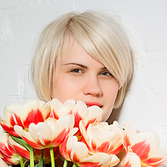 Image showing beautiful woman with a bouquet of roses