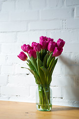 Image showing beautiful pink tulips in a vase