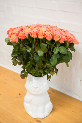 Image showing beautiful roses in a vase-cat