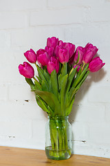 Image showing beautiful pink tulips in a vase