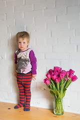 Image showing child with tulips