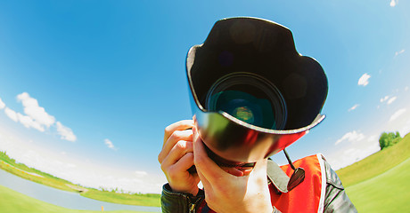 Image showing funny fishe eye shot of a photographer