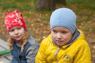 Image showing two children in a park in autumn, portrait