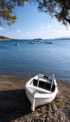 Image showing Boat on shore and sea