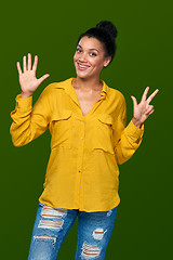 Image showing Woman showing eight fingers