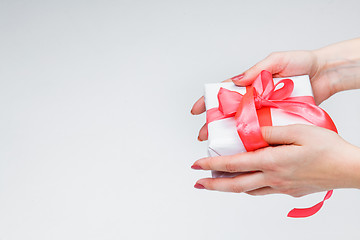 Image showing Female hands holding gift box
