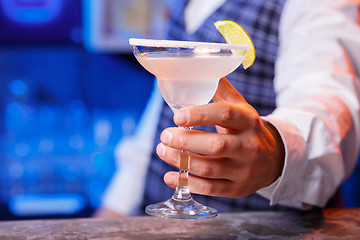 Image showing Barman at work, preparing cocktails.