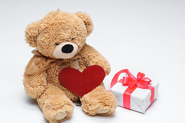 Image showing Teddy Bears couple with red heart. Valentines Day concept.