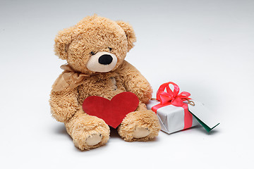 Image showing Teddy Bears couple with red heart. Valentines Day concept.