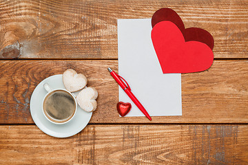 Image showing The blank sheet of paper and pen with  hearts  