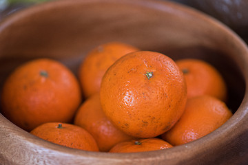 Image showing tangerines on wooden background