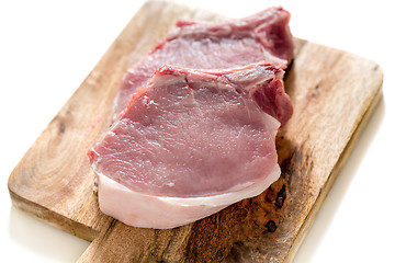 Image showing Chunks of pork loin on a cutting board.